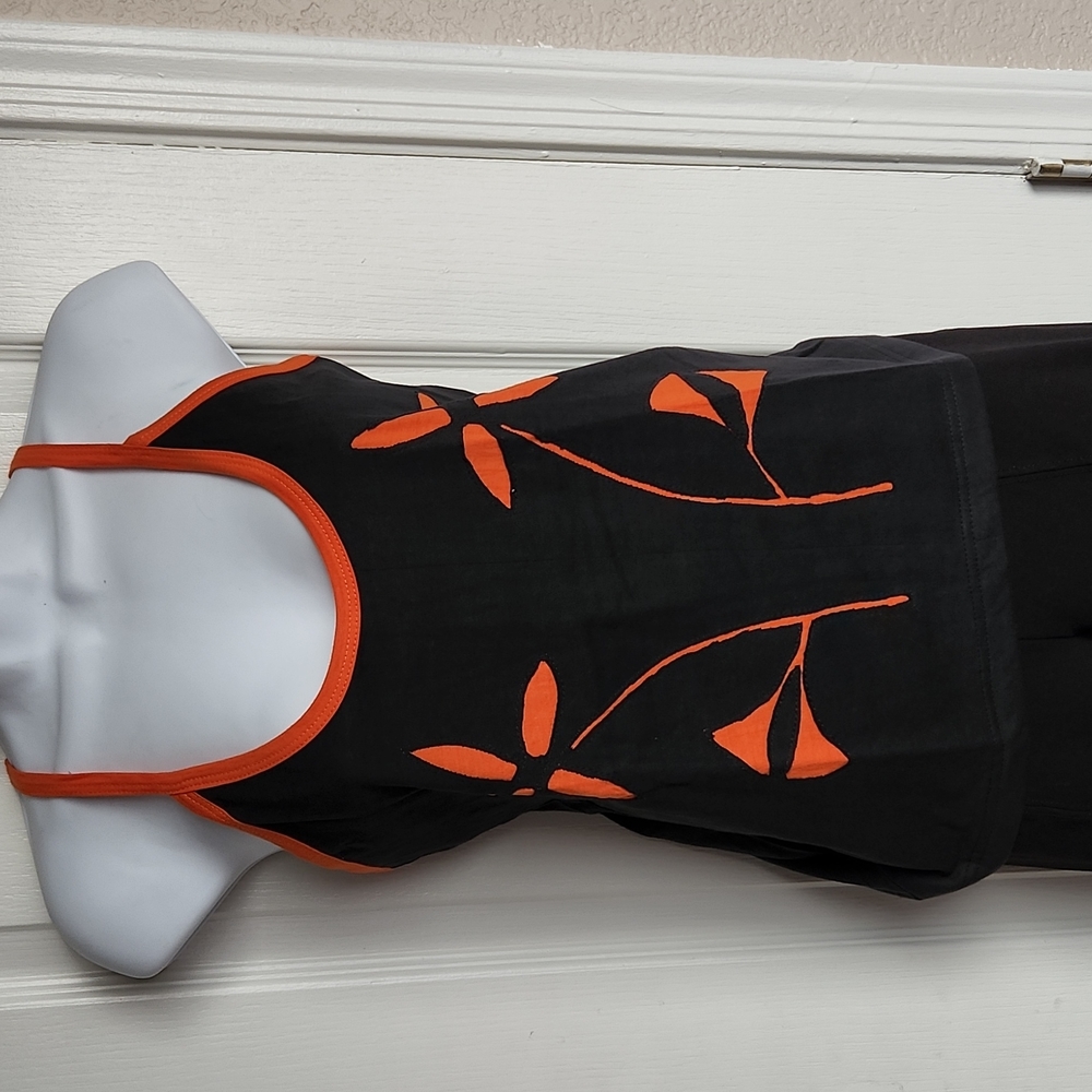 100% cotton made in Nepal black tank top with orange.